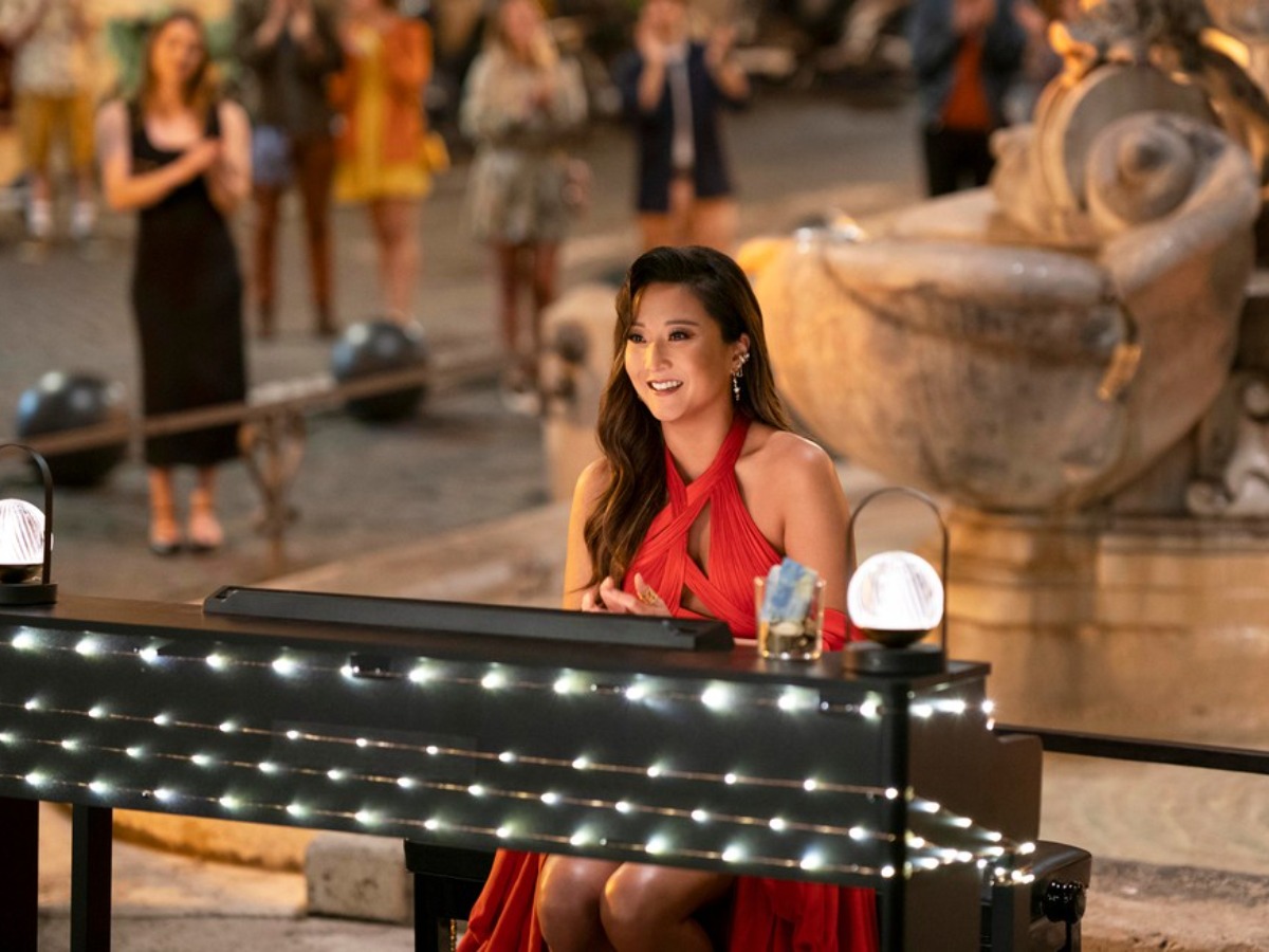 emily in paris mindy red dress Emily in Paris' is clearly not flaunting its biggest asset enough